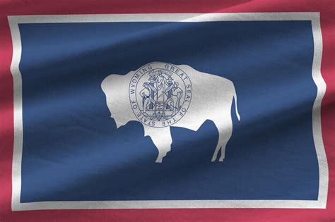 Premium Photo Wyoming Us State Flag With Big Folds Waving Close Up