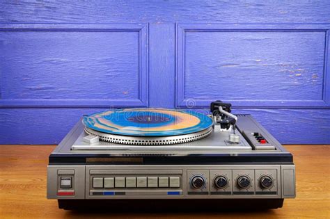 Vintage Turntable Vinyl Record Player with Blue and Orange Vinyl Stock ...