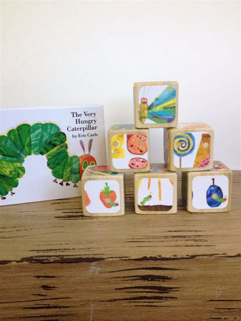 The Very Hungry Caterpillar Blocks Are Next To A Book