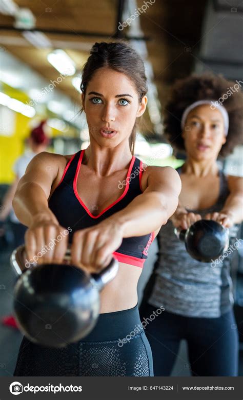 Group Fit Young People Lifting Dumbbells Exercise Class Gym Stock Photo ...