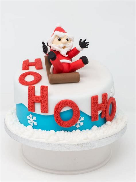 Santa Sledging Cake - Decorated Cake by Juliettes' Cakes - CakesDecor