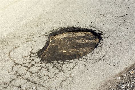 Road damage - Stock Image - F021/3068 - Science Photo Library