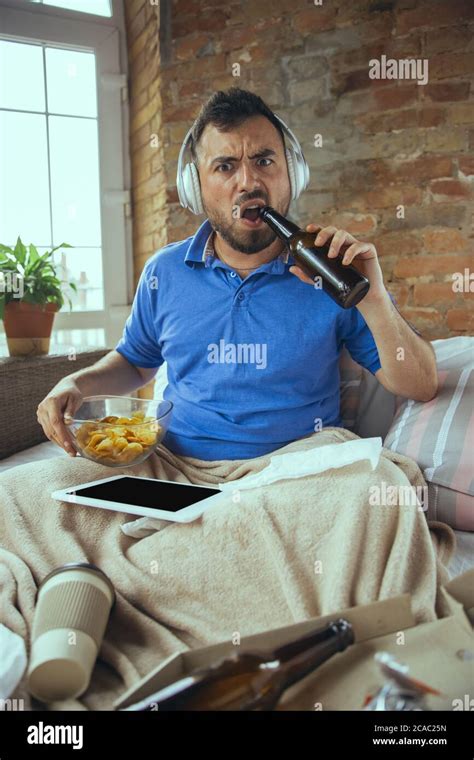 Eating Crisps Drinks Beer Lazy Man Living In His Bed Surrounded With