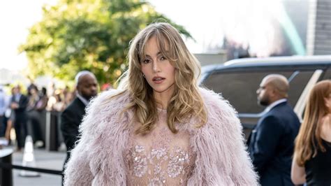 Suki Waterhouse Is Nearly Naked In See Through Lace Dress Under Faux Fur Coat