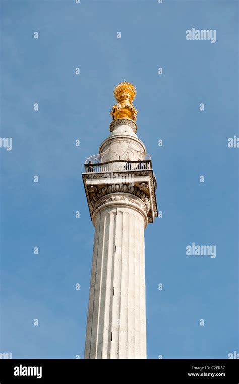 The Monument. A memorial to the Great Fire of London in 1666. Designed ...