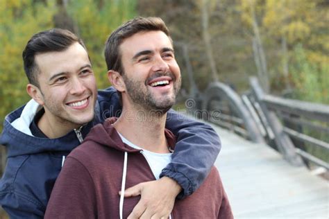 Gay Couple Enjoying The Park In Autumn Stock Image Image Of Lifestyle Leaf