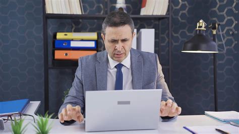 Nervous Businessman Waiting Impatiently By Laptop Waiting For News