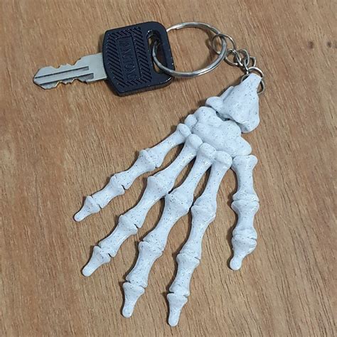 Skeleton Hand Keychain Hobbies And Toys Toys And Games On Carousell