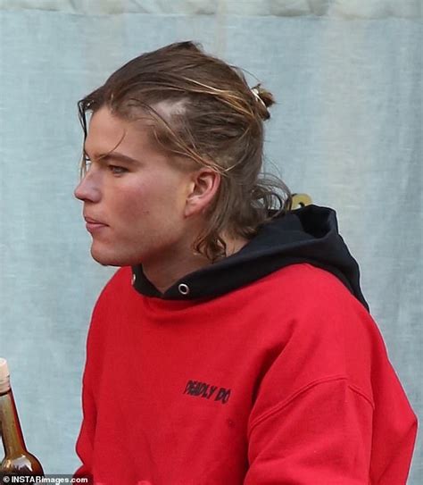 Jordan Barrett Looks Dishevelled In An Oversized Red Jumper And Tri