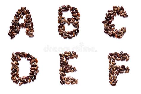 Designer Spotted Beans In The Shape Of Letters For The Designer Stock