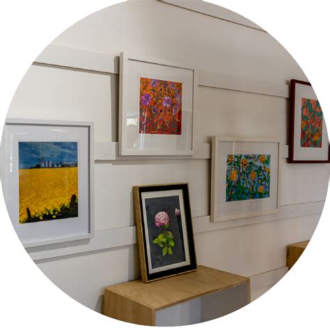 hanging art – Artisans Gallery | Studios | Bistro
