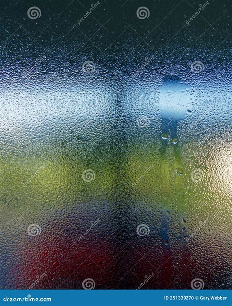 Condensation on the Inside of a Window in a Cold Damp House Stock Photo