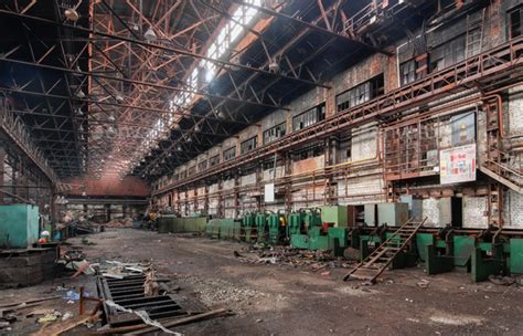 Industrial interior of an old abandoned factory Stock Photo by saoirse2010