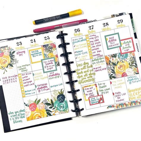 An Open Planner With Flowers On It