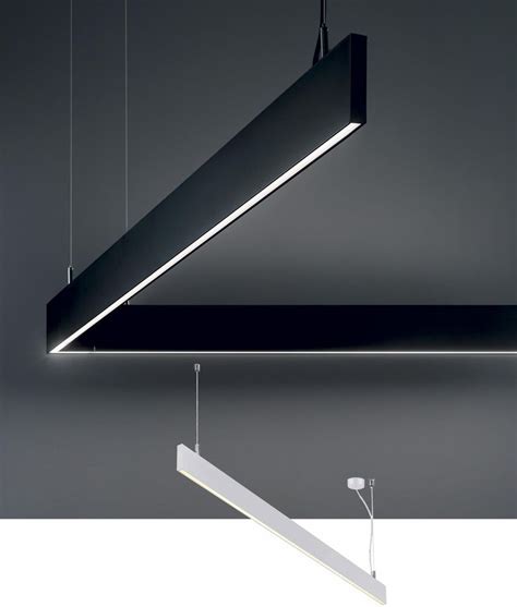 A Suspended Light Fixture In The Shape Of A Rectangle With Two Lights