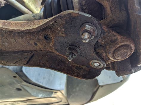 Sheared off one of the lower ball joint screws when attempting to