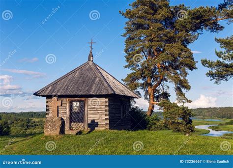 Wooden Chapel And Stone Cross On The Top Of Savkin Hill Pushkinskiye