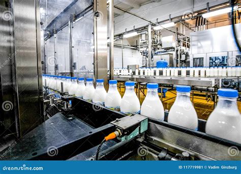 Milk production at factory stock image. Image of liquid - 117719981