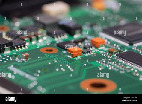 Laptop Motherboard Closeup Printed Circuit Board With SMD Capacitors