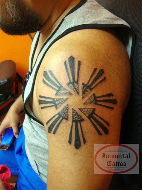 IMMORTAL TATTOO MANILA PHILIPPINES by frank ibanez jr.: Photographers tattoo/ Filipino sun tattoo