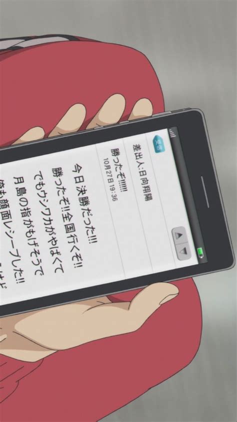 A Person Holding Up A Cell Phone In Their Hand With An Anime Character