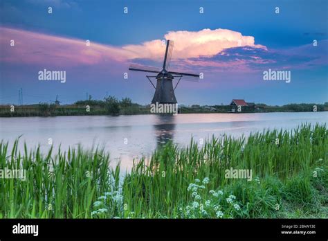 Traditional Dutch Windmills At The Unesco World Heritage Site In