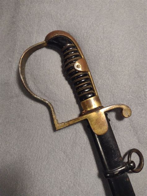 Mavin | GERMAN SWORD WW2 CARL EICKHORN SABER WITH SCABBARD