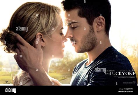 TAYLOR SCHILLING, ZAC EFRON POSTER, THE LUCKY ONE, 2012 Stock Photo - Alamy