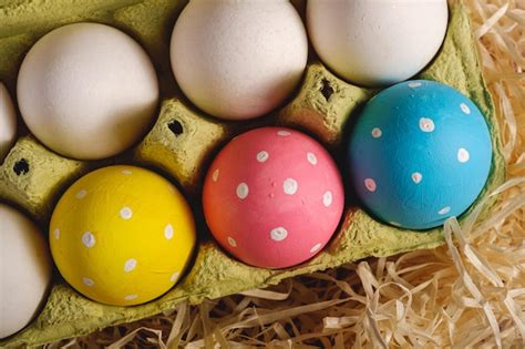 Premium Photo Colorful Polka Dot Easter Eggs In Egg Tray On Wooden