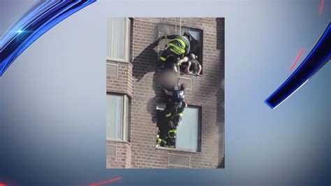 Watch Fdny Saves Woman Hanging From Burning Manhattan Skyscraper