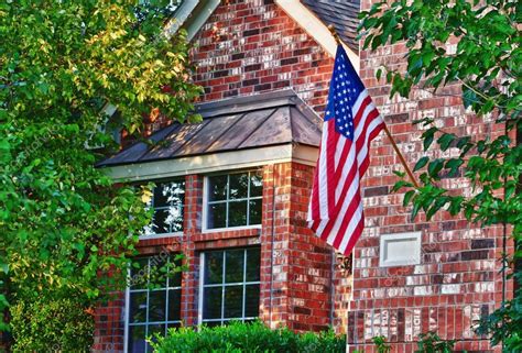 House with patriotic American flag — Stock Photo © krisrobin #21842009