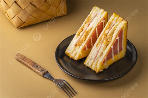 Sweet And Delicious Triangle Bread On The Table Background And Picture