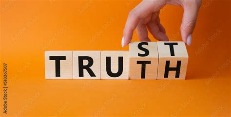 Trust And Truth Symbol Businessman Hand Turns A Cube And Changes The