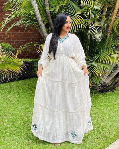 Simple Habesha Dress With Delicate Light Blue Designs Habesha Kemis