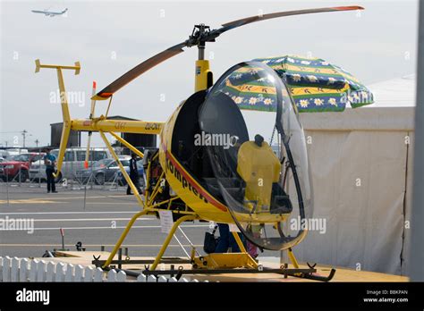 A small civilian helicopter Stock Photo - Alamy