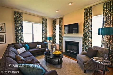 Loving This Model Home Those Floor To Ceiling Curtains Living Room