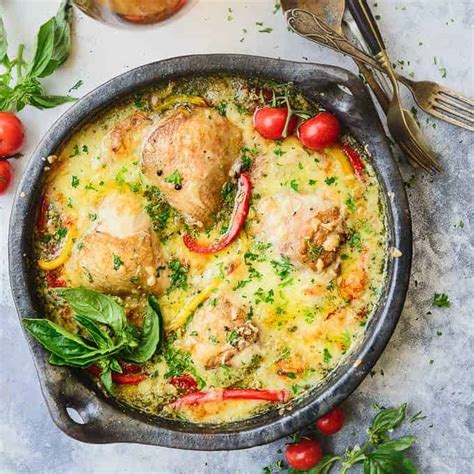 Creamy Baked Pesto Chicken Thighs Recipe Step By Step Whiskaffair