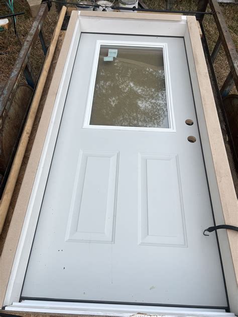 Traditions Collection exterior steel door manufactured by Therma-Tru