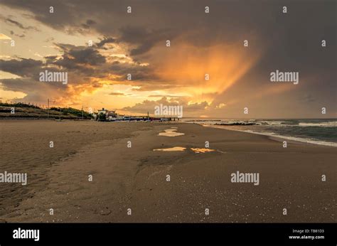 Beautiful orange sunset sky on the beach Stock Photo - Alamy