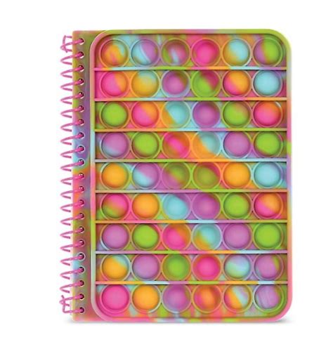 A Spiral Notebook With Colorful Circles On It