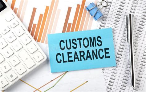 Word Customs Clearance On Notebook With Pencil On The Grey Background