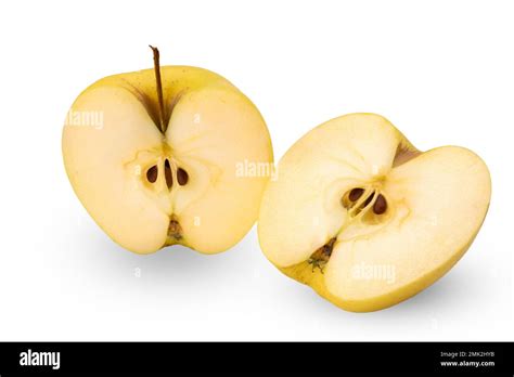 Golden Delicious Apple Cut In Half Isolated On White With Clipping Path