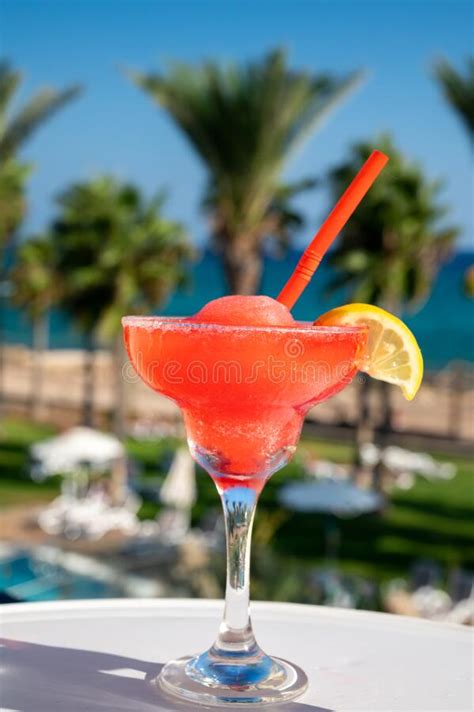 Colourful Cold Strawberry Daiquiri Cocktail Drink Served In Glass At