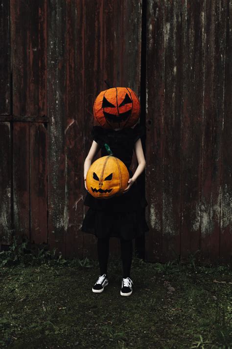 Woman With Face Paint With Pumpkin · Free Stock Photo