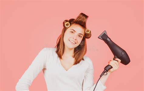 Smiling Woman With Hair Dryer Beautiful Happy Girl With Straight Hair