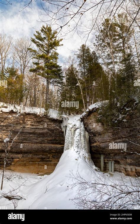 Munising, Michigan - Munising Falls in winter in Pictured Rocks ...