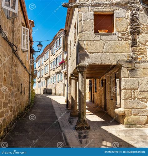 Narrow Streets with Arcades with Ancient Stone Columns in the Center of
