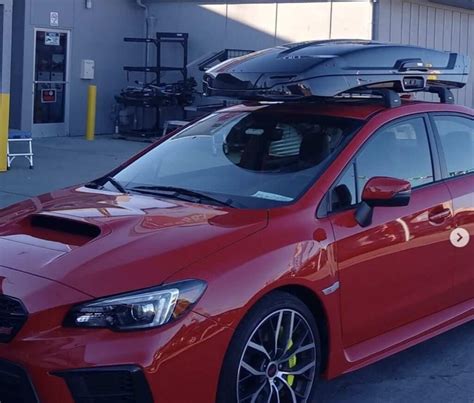 Subaru Wrx With Thule Aeroblade Edge Roof Rack And Thule Motion Roof