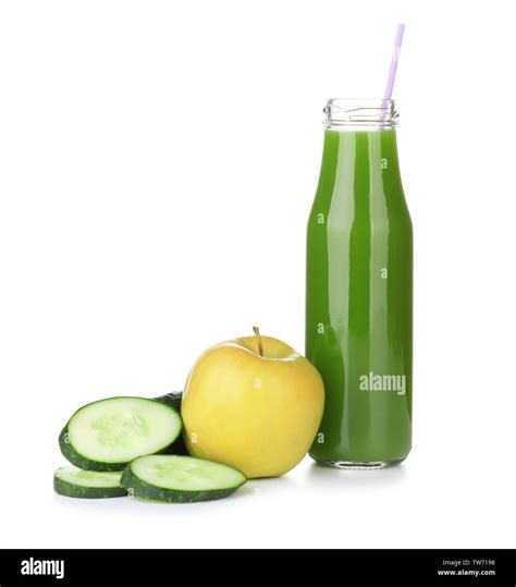 Green Juice In Bottle And Ingredients On White Background Stock Photo