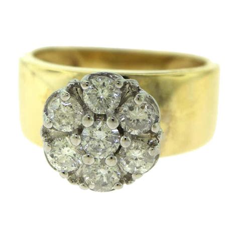 Vintage Flower Halo Round Diamond In Yellow Gold Engagement Ring For